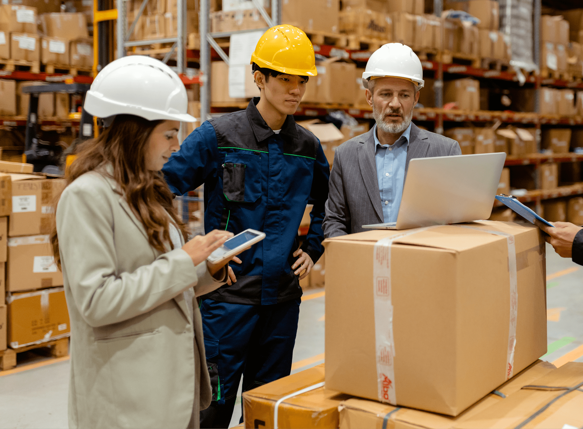 Team analyzing inventory in warehouse setting